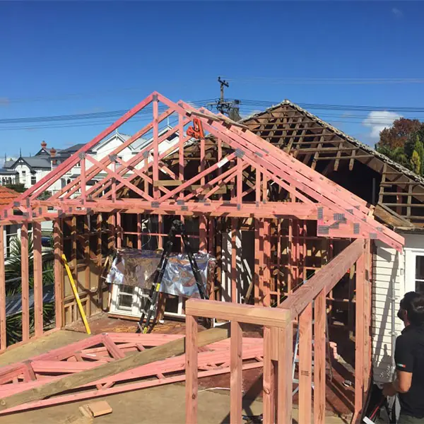 Birkenhead 1950s state house during renovation and extension, with new roof trusses going up