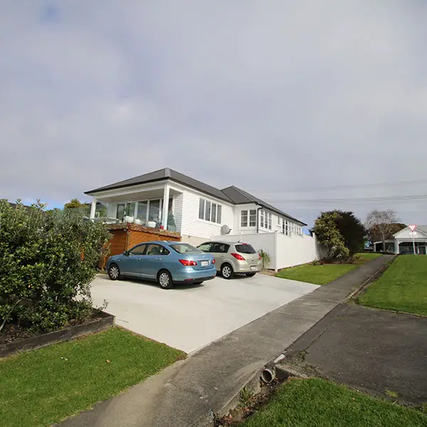 Renovated Birkenhead 1950s state house from the street