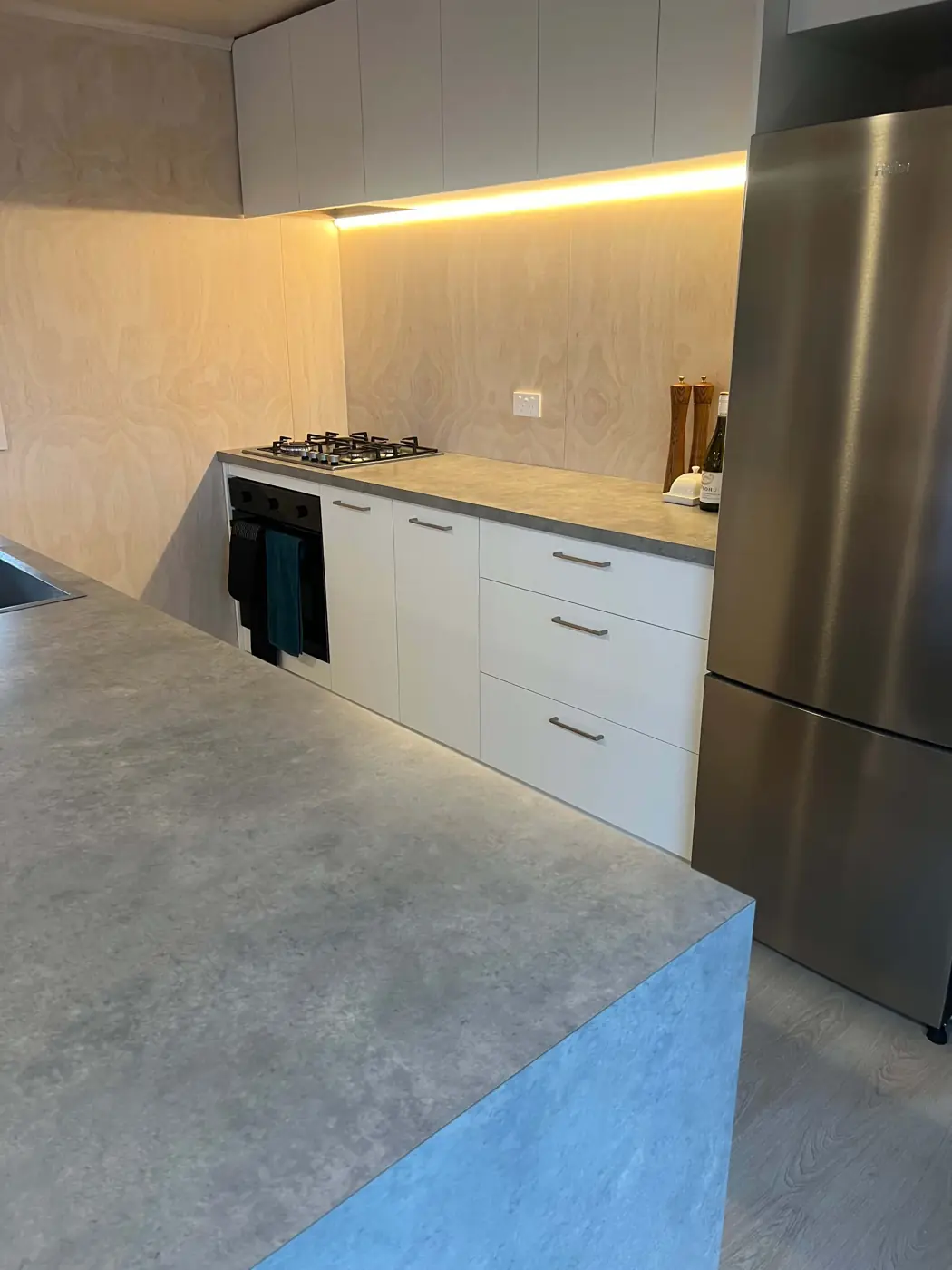Kitchen bench with stone-look benchtop in a Fab Living prefab home