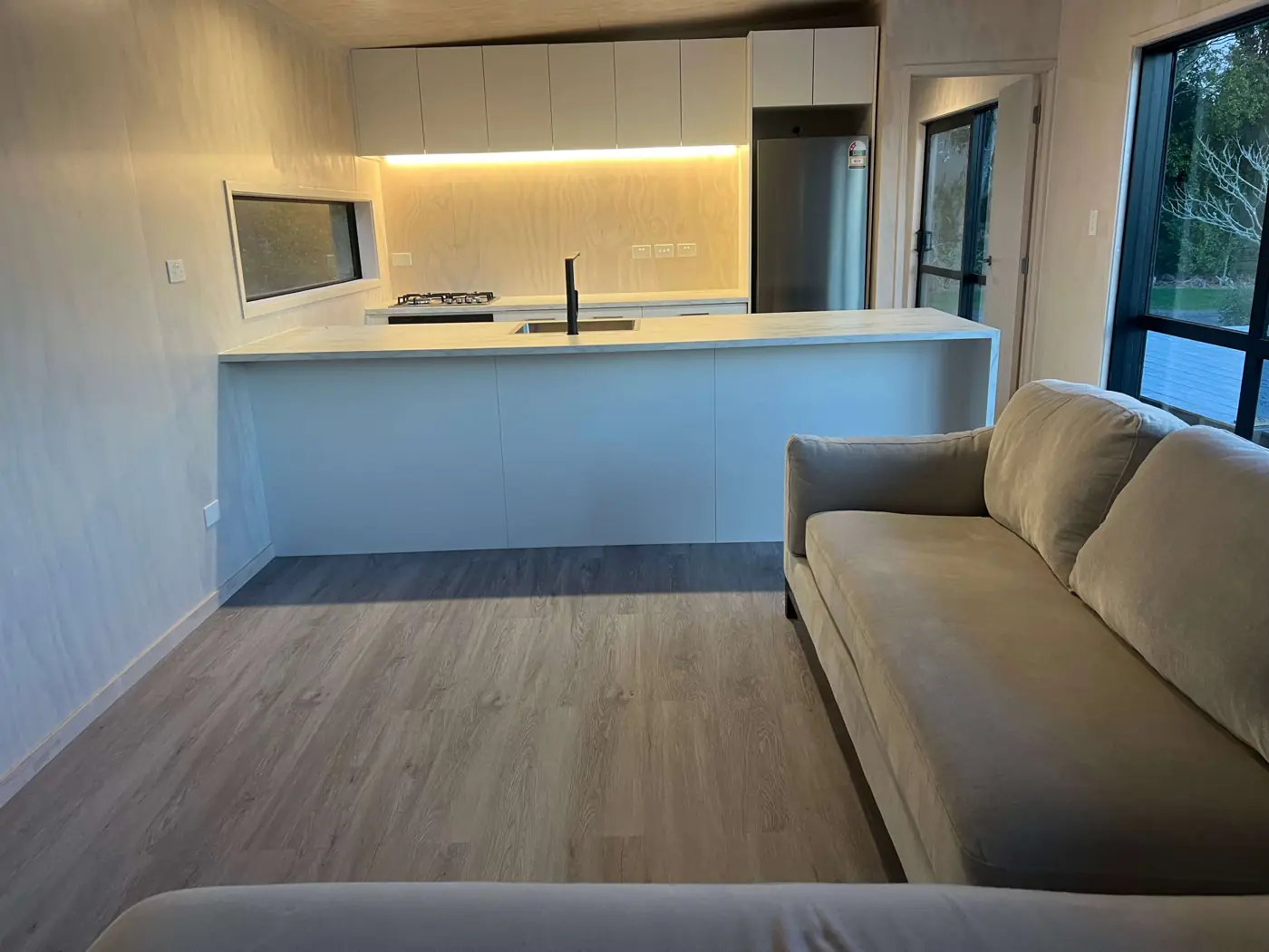 Open-plan kitchen and living area inside a Fab Living prefab home
