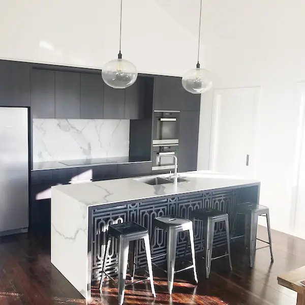 New kitchen with marble benchtop in the renovated Remuera bungalow