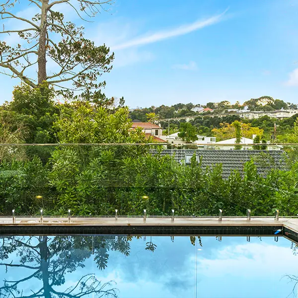After: refurbished pool and hardwood deck at a Remuera bungalow